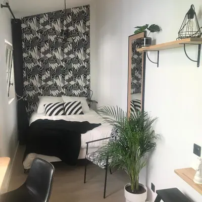 Un ou plusieurs lits dans un hébergement de l'établissement La Joueuse, Et pop Et Chic !