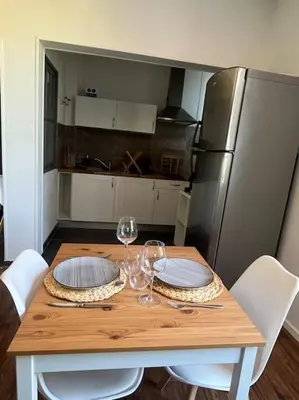 Cuisine ou kitchenette dans l'établissement Le petit jardin de Bellune