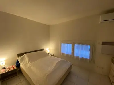 Un ou plusieurs lits dans un hébergement de l'établissement Appartement Duplex Calme, Proche Plage et Centre à Fouras - FR-1-709-78