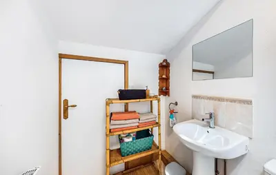Salle de bains dans l'établissement Gîte Au Naturel