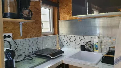 Cuisine ou kitchenette dans l'établissement Studio du 44