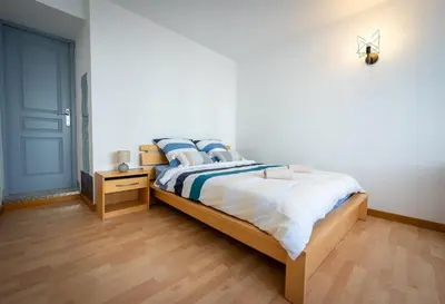 Un ou plusieurs lits dans un hébergement de l'établissement Logement Vacances La Rochelle