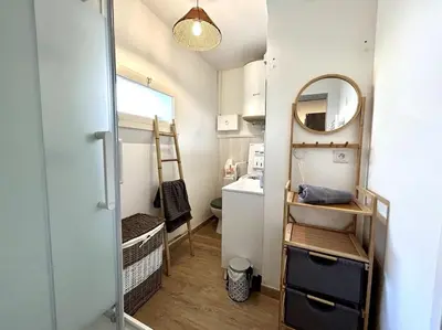 Un ou plusieurs lits dans un hébergement de l'établissement Côté Cour - Appartement en plein centre-ville & proche des thermes