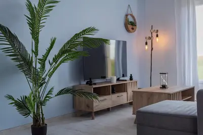 Télévision ou salle de divertissement dans l'établissement Résidence Campagne Charentaise