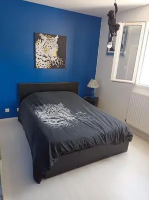 Un ou plusieurs lits dans un hébergement de l'établissement Maison plain pied 2 chambres