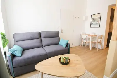Coin salon dans l'établissement G2 Appartement Familial lumineux RDC centre Angouleme