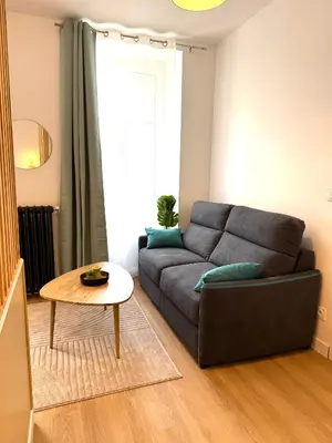 Coin salon dans l'établissement G2 Appartement Familial lumineux RDC centre Angouleme