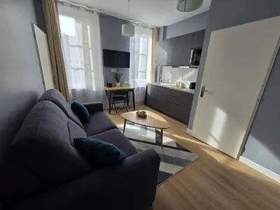 Coin salon dans l'établissement G4 - Appartement 2 ch Climatisé Centre Angoulême