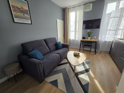 Coin salon dans l'établissement G4 - Appartement 2 ch Climatisé Centre Angoulême