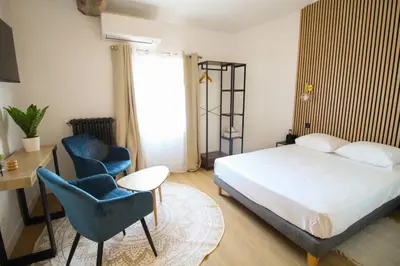 Un ou plusieurs lits dans un hébergement de l'établissement G5 Appartement Climatisé Centre Angouleme