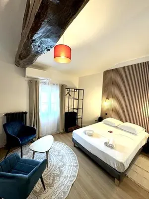 Un ou plusieurs lits dans un hébergement de l'établissement G5 Appartement Climatisé Centre Angouleme