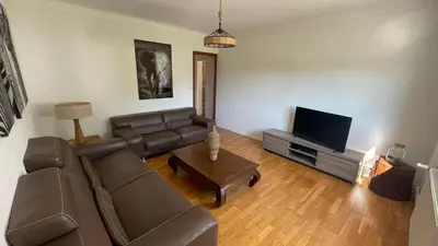 Coin salon dans l'établissement Maison de la vallée