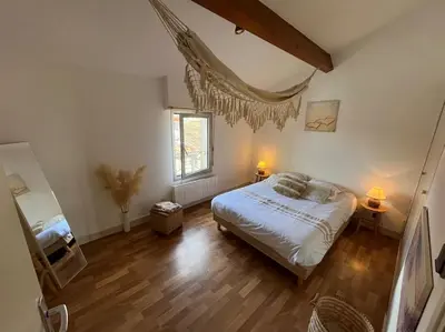Un ou plusieurs lits dans un hébergement de l'établissement Superbe appartement cosy