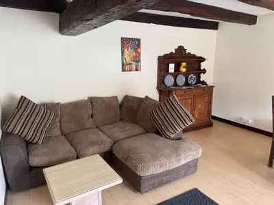 Coin salon dans l'établissement Comfortable countryside gite access to jacuzzi