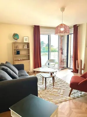 Coin salon dans l'établissement Magnifique appartement vue îles et océan-seaside-