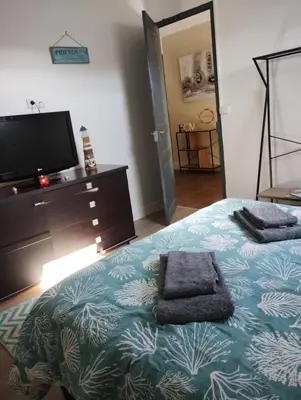 Un ou plusieurs lits dans un hébergement de l'établissement Chambres chez l'habitant proche sortie A10
