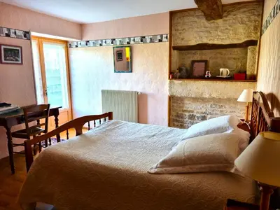 Un ou plusieurs lits dans un hébergement de l'établissement Chambres d'hôtes entre Niort et Marais Poitevin