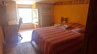 Un ou plusieurs lits dans un hébergement de l'établissement Chambres d'hôtes entre Niort et Marais Poitevin