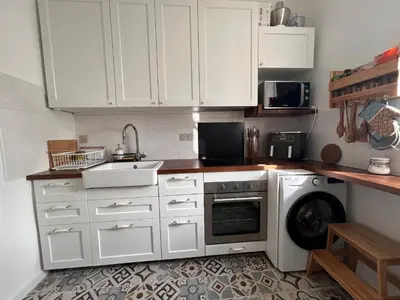 Cuisine ou kitchenette dans l'établissement YOUSRA Appartement