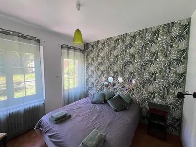 Un ou plusieurs lits dans un hébergement de l'établissement Gîte 6 à 8 personnes calme et repos