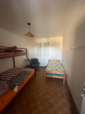 Un ou plusieurs lits dans un hébergement de l'établissement Gîte voyageurs