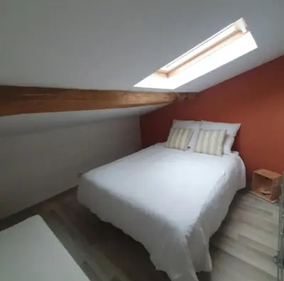 Un ou plusieurs lits dans un hébergement de l'établissement Chambre chez l'habitant avec petit déjeuner à 5 mins du Futuroscope