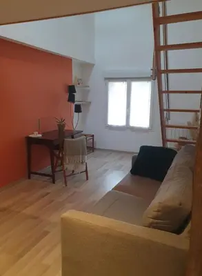 Coin salon dans l'établissement Chambre chez l'habitant avec petit déjeuner à 5 mins du Futuroscope