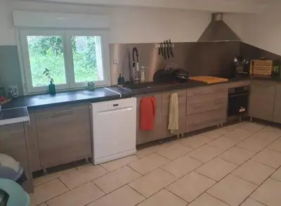Cuisine ou kitchenette dans l'établissement Chambre chez l'habitant avec petit déjeuner à 5 mins du Futuroscope