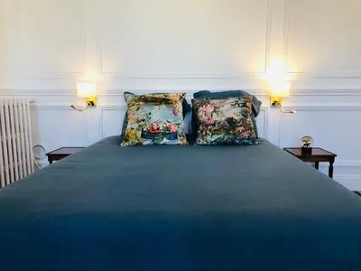 Un ou plusieurs lits dans un hébergement de l'établissement L'Hôtel Particulier du 12