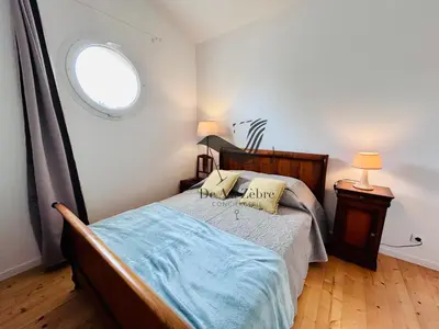 Un ou plusieurs lits dans un hébergement de l'établissement ChaviD 17 - Spacieuse maison avec jardin