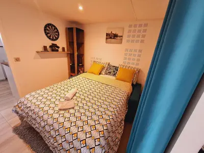 Coin salon dans l'établissement Joli studio 25m2 avec cuisine