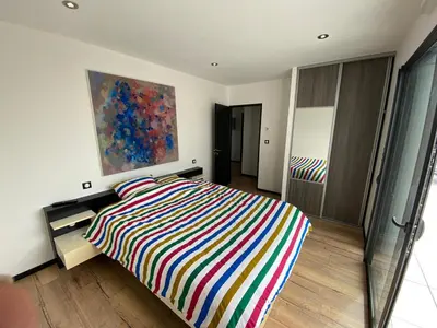Un ou plusieurs lits dans un hébergement de l'établissement superbe villa neuve