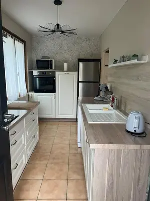 Cuisine ou kitchenette dans l'établissement Gîte - Comme à la maison
