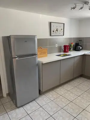 Cuisine ou kitchenette dans l'établissement La Belle Évasion
