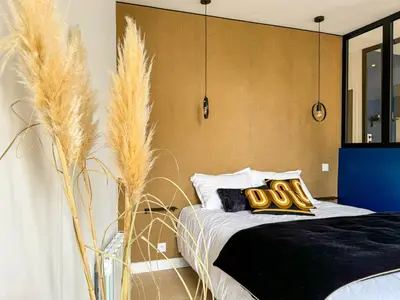 Un ou plusieurs lits dans un hébergement de l'établissement Cozy Niort