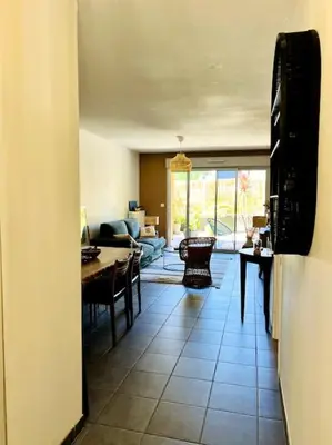 Coin salon dans l'établissement La parenthèse - jardin privatif