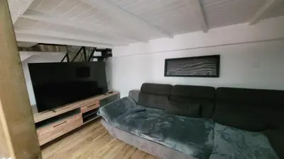 Coin salon dans l'établissement Duplex KeLi