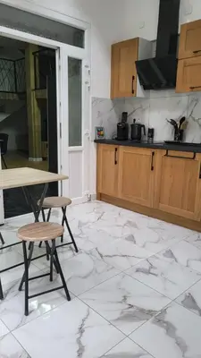 Cuisine ou kitchenette dans l'établissement Duplex KeLi
