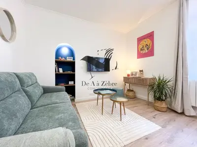 Coin salon dans l'établissement L'Escale d'Audry - Appartement sur cour situé en plein coeur de ville
