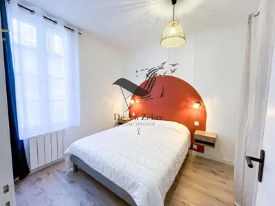 Un ou plusieurs lits dans un hébergement de l'établissement L'Escale d'Audry - Appartement sur cour situé en plein coeur de ville