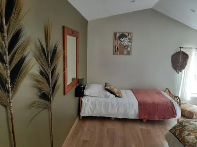 Un ou plusieurs lits dans un hébergement de l'établissement LA VINCELLA Gîte de charme , proche d'Angoulême, 3 chambres