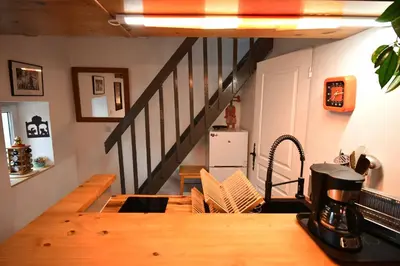 Cuisine ou kitchenette dans l'établissement la petite maison pour deux