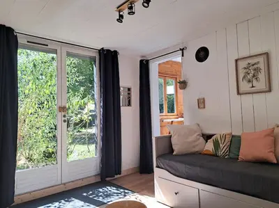 Coin salon dans l'établissement La Cabane des Dunes - Parking privatif