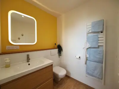 Salle de bains dans l'établissement La Cabane des Dunes - Parking privatif