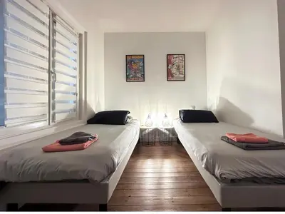 Un ou plusieurs lits dans un hébergement de l'établissement Parthenay Centre-Ville - Maison avec 1 chambre