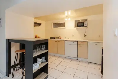 Cuisine ou kitchenette dans l'établissement LE SOUVENIR D'AILLEURS T2 65m2
