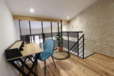 Coin salon dans l'établissement Le duplex du 71 B