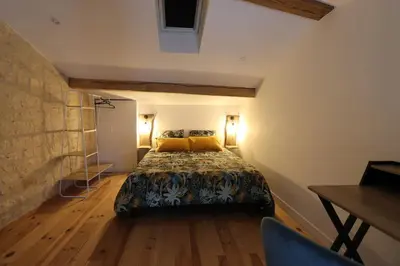 Un ou plusieurs lits dans un hébergement de l'établissement Le duplex du 71 B