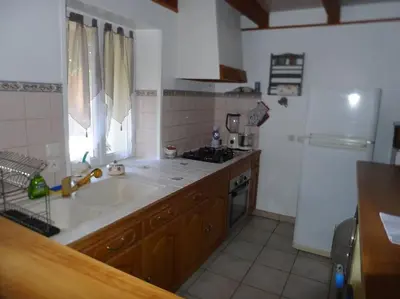 Cuisine ou kitchenette dans l'établissement location thezacaise