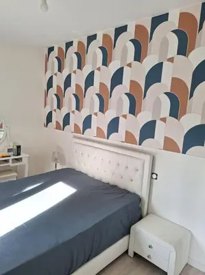 Un ou plusieurs lits dans un hébergement de l'établissement Belle maison au bord du plan d'eau